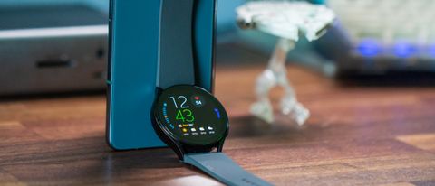 Samsung Galaxy Watch 5 laying upright with clock face on