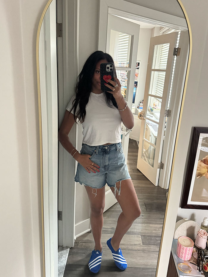 Sierra Mayhew wearing denim shorts.