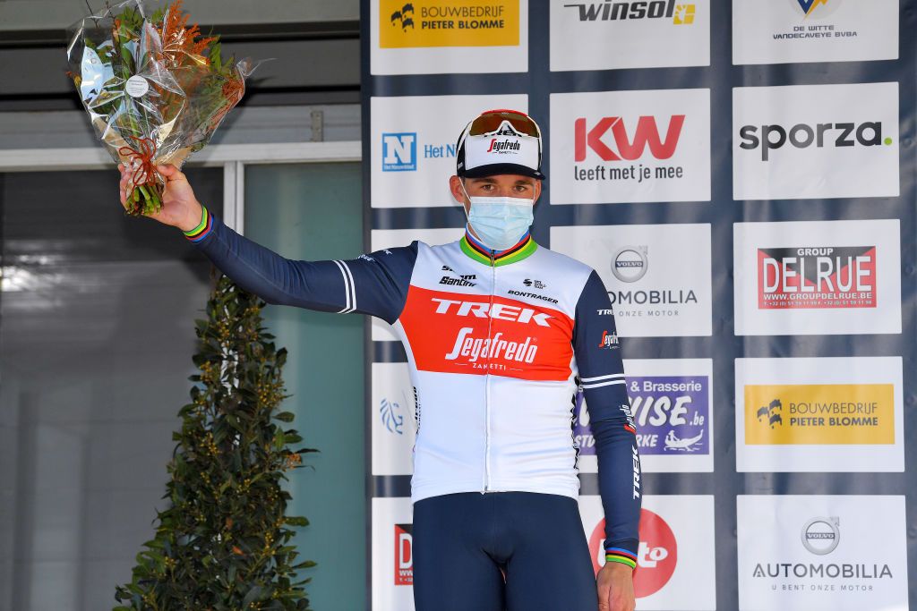 KOKSIJDE BELGIUM MARCH 19 Podium Mads Pedersen of Denmark and Team Trek Segafredo Celebration during the 19th Bredene Koksijde Classic 2021 a 199km race from Bredene to Koksijde Mask Covid safety measures Flowers BredeneKoksijde on March 19 2021 in Koksijde Belgium Photo by Luc ClaessenGetty Images