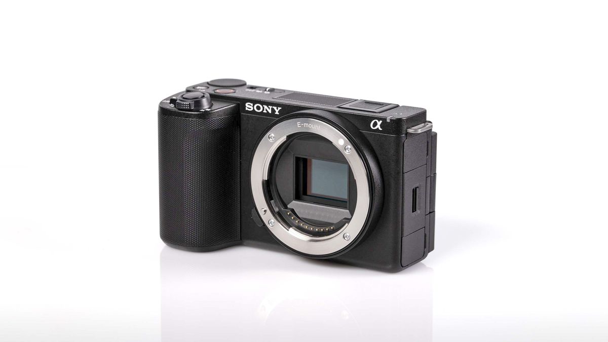 Sony ZV-E10 II on reflective surface and white background