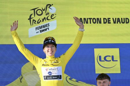 Yellow jersey of overall leader Team SD Worx-Protime's Dutch rider Lorena Wiebes poses on the podium after she won the first (out of 9) stage of the fifth edition of the Women's Tour de France cycling race, 138 km from Lausanne to Lausanne on August 1, 2026. (Photo by NICOLAS TUCAT / AFP)