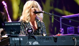 Christine McVie performs with Fleetwood Mac at the 2018 iHeartRadio Music Festival at the T-Mobile Arena on September 21, 2018 in Las Vegas, Nevada