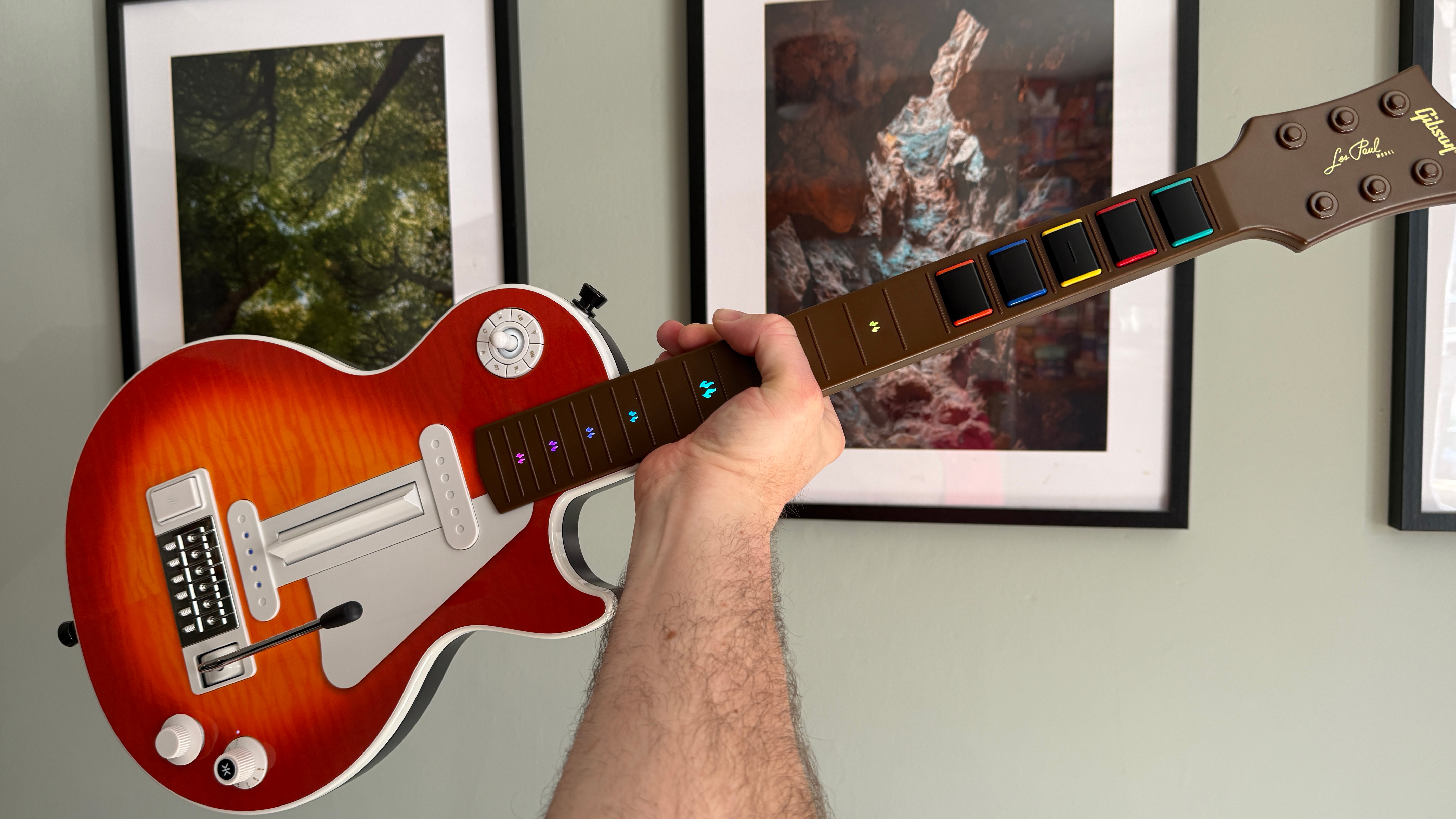 The reviewer holding the CRKD Gibson Les Paul Pro Edition Guitar