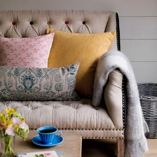 upholstered sofa with cushions