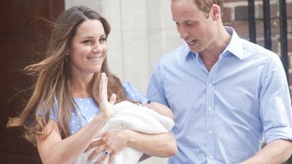 Catherine, Duchess of Cambridge and Prince William, Duke of Cambridge depart The Lindo Wing with their newborn son at St Mary's Hospital on July 22, 2013 in London, England.