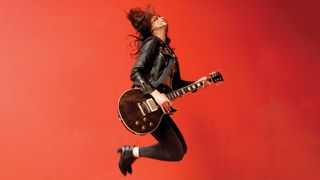 Laura Cox playing a Gibson Les Paul