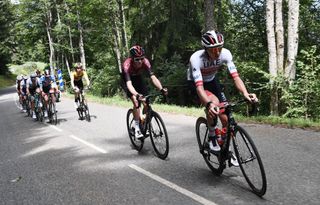 Team UAE Emirates rider Slovenias Tadej Pogacar R climbs during the fifth stage of the 72nd edition of the Criterium du Dauphine cycling race 153 km between Megeve and Megeve on August 16 2020 Photo by AnneChristine POUJOULAT AFP Photo by ANNECHRISTINE POUJOULATAFP via Getty Images