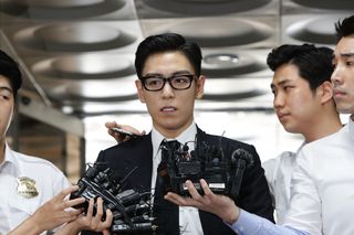 T.O.P, of South Korean boyband Big Bang arrives at the Seoul Central District Court for hearing on his marijuana usage case on July 20, 2017 in Seoul, South Korea.