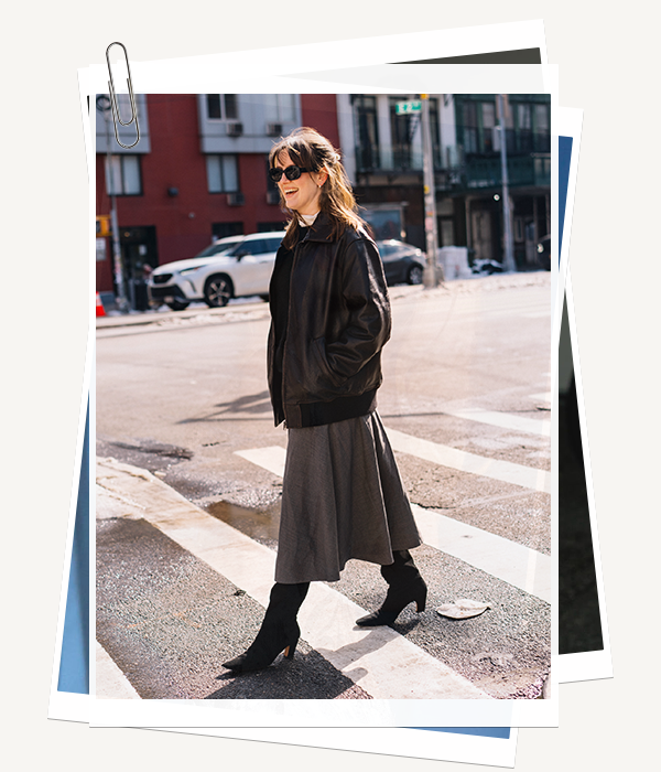 Halie LeSavage wearing a leather bomber jacket