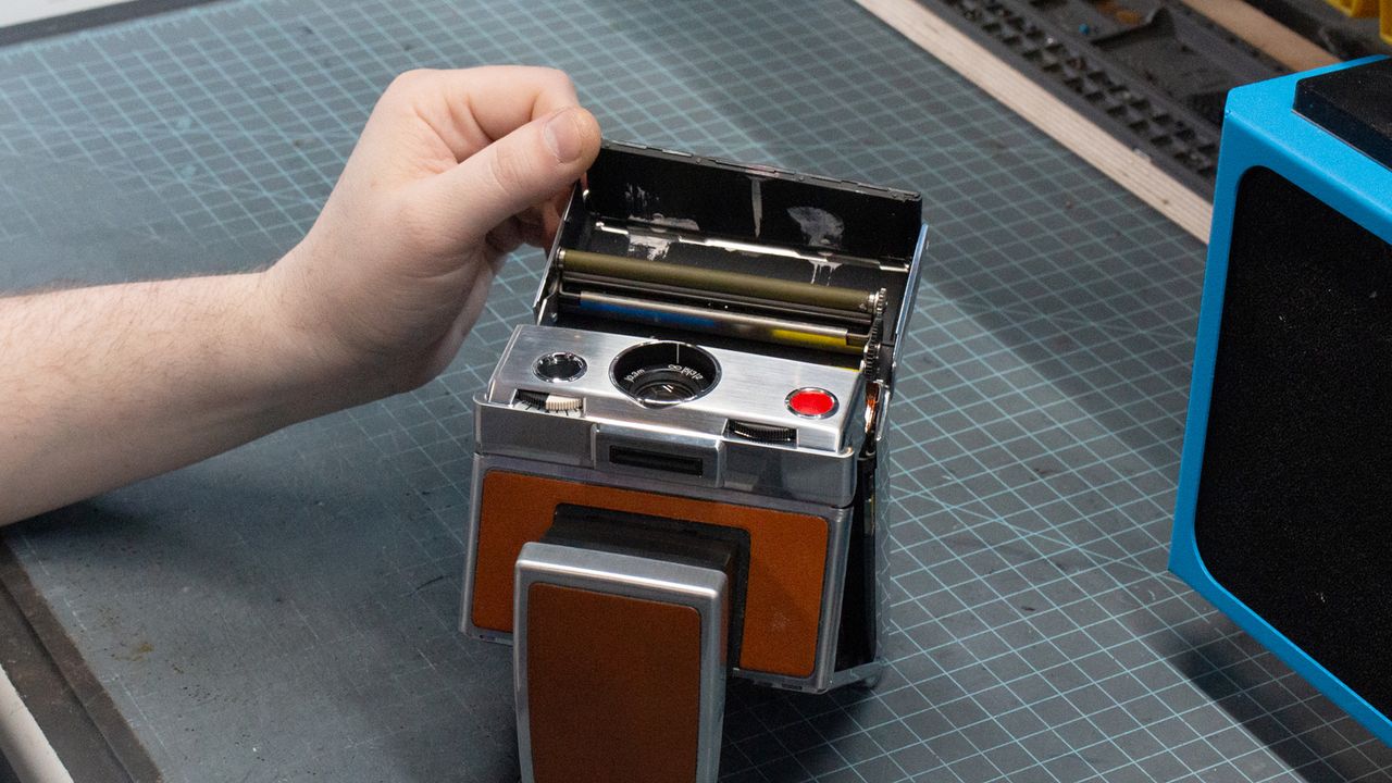 Tear down of the Polaroid SX-70 camera in the Retrospekt workshop during a refurbish