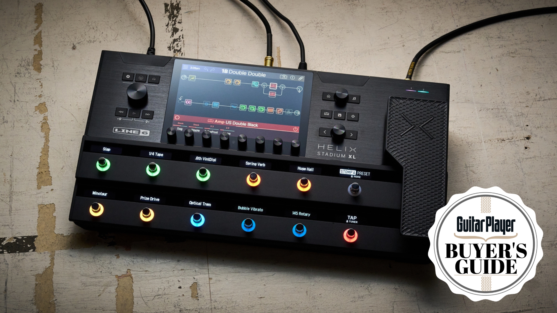 A Line 6 Helix Stadium XL multi-effects pedal lying on a worn concrete floor
