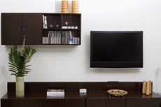 Magazines and a vase on a coffee table