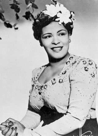 Billie Holiday with trademark Gardenias in her hair