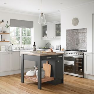 bright and airy white and grey kitchen with freestanding island