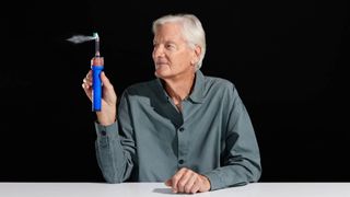 James Dyson holding the Dyson CameraJet