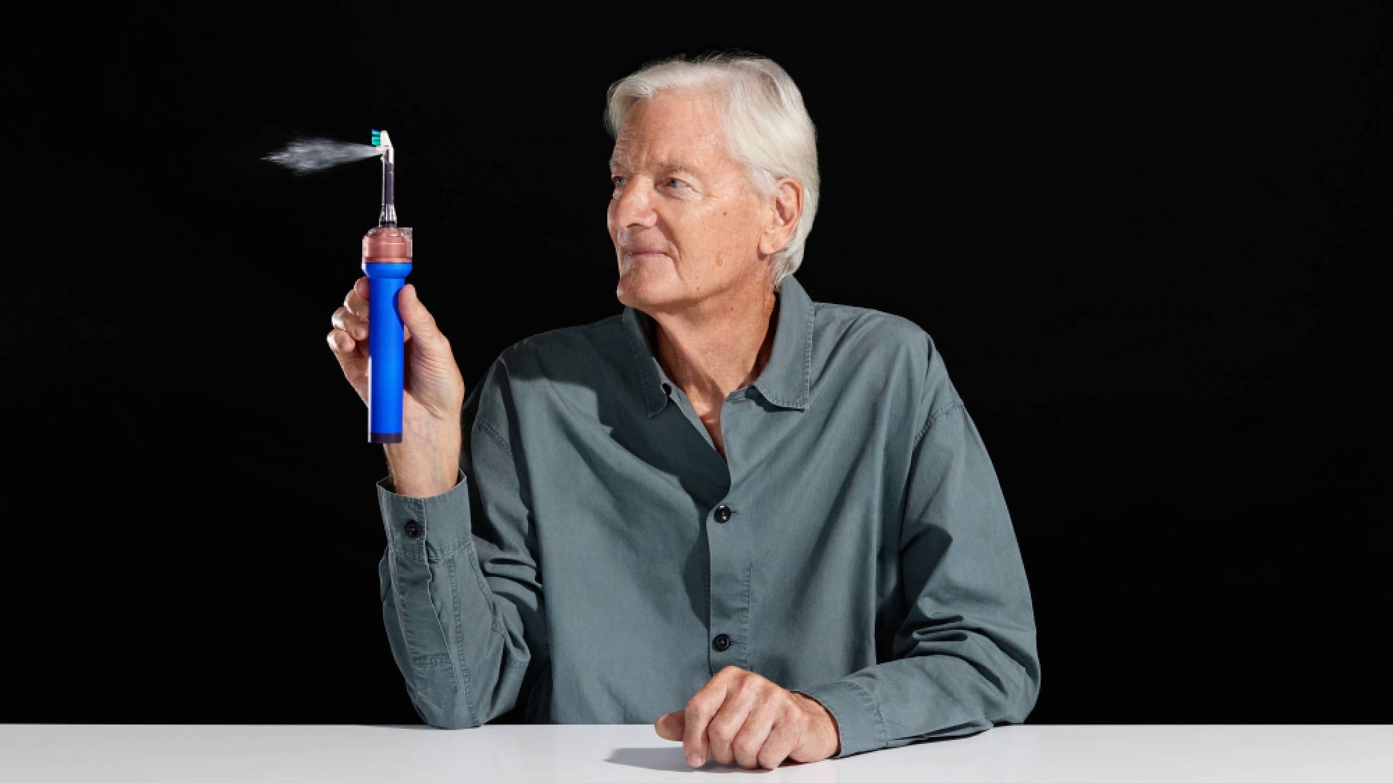 James Dyson holding the Dyson CameraJet