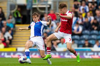 Tyler Morton (6)of Blackburn Rovers in a challenge with Alex Scott (7) of Bristol City during the Sky Bet Championship match between Blackburn Rovers and Bristol City at Ewood Park, Blackburn on Saturday 3rd September 2022.