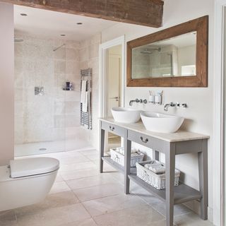 bathroom with mirror and white basin