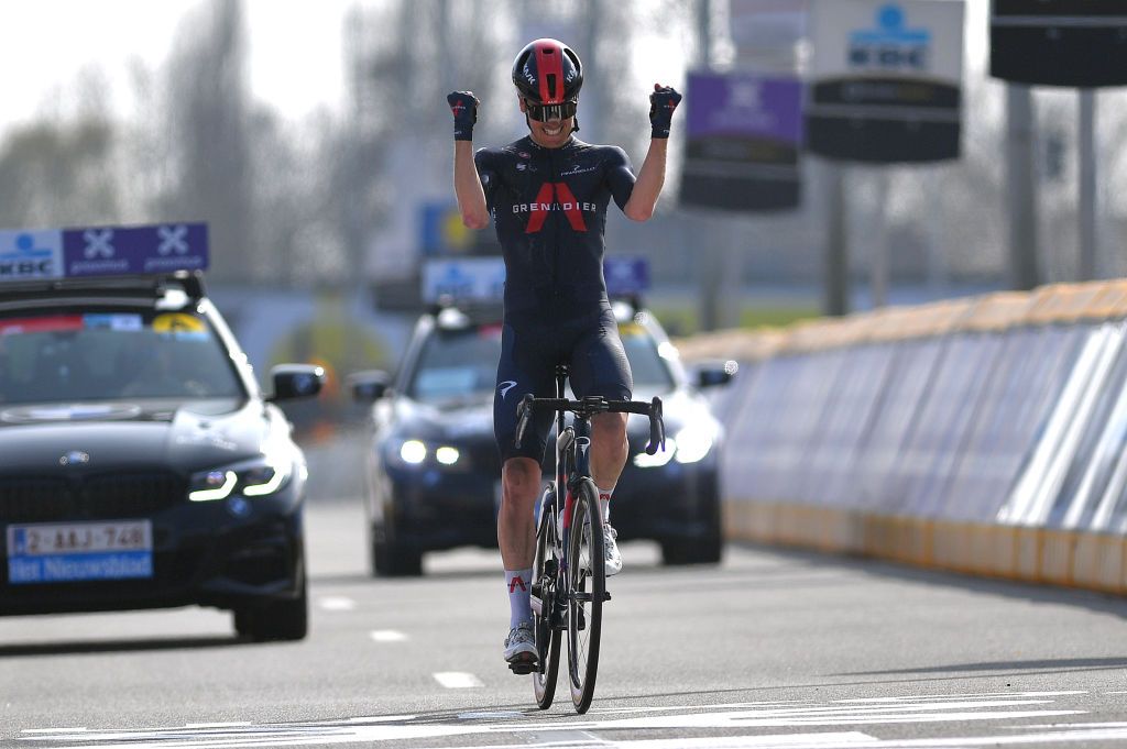 WAREGEM BELGIUM MARCH 31 Arrival Dylan Van Baarle of Netherlands and Team INEOS Grenadiers Celebration during the 75th Dwars Door Vlaanderen 2021 Mens Elite a 1841km race from Roeselare to Waregem DDV DDV21 FlandersClassic A travers la Flandre on March 31 2021 in Waregem Belgium Photo by Luc ClaessenGetty Images