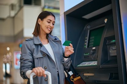 Woman with an airline points credit card travelling at the airport