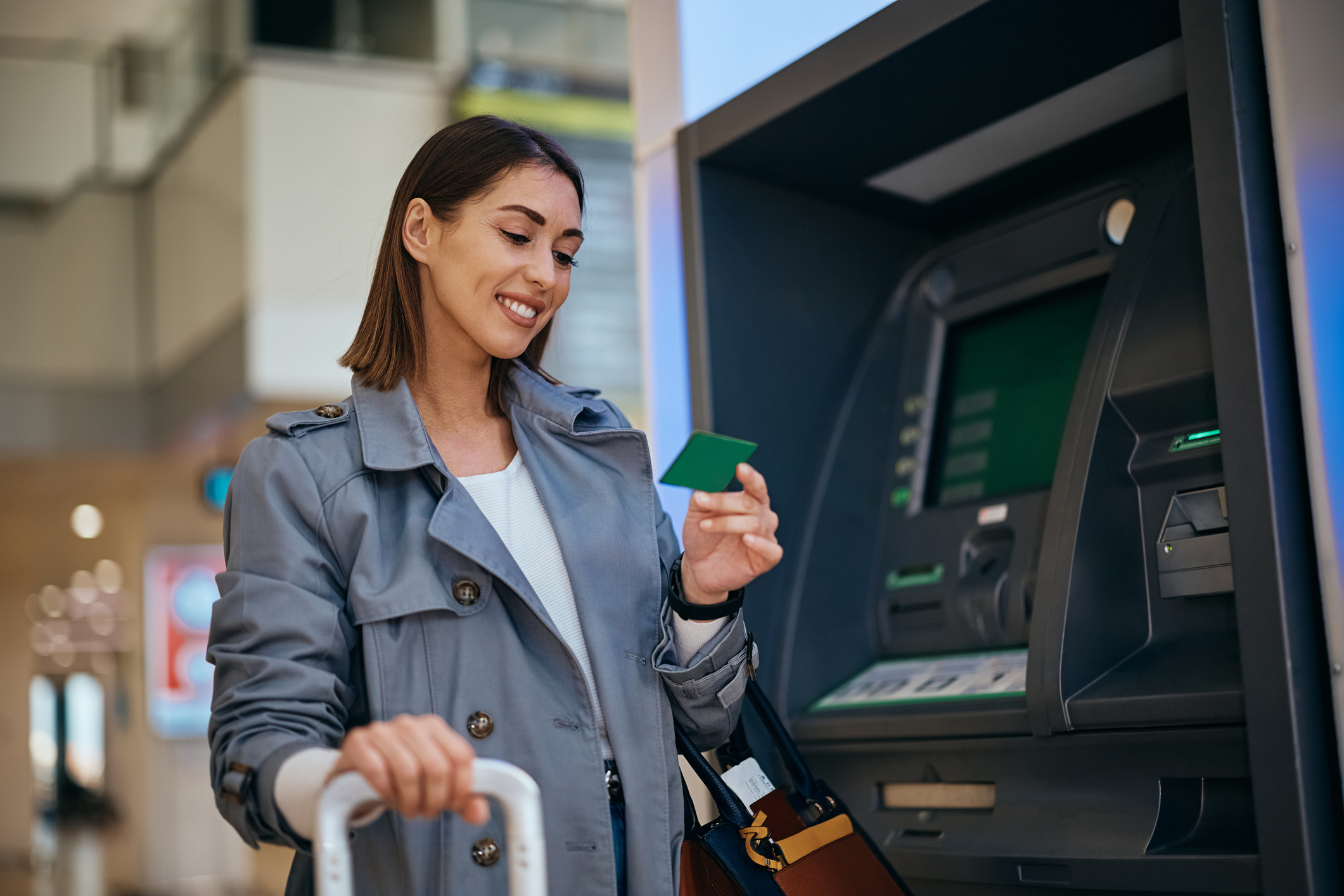 Woman with an airline points credit card travelling at the airport