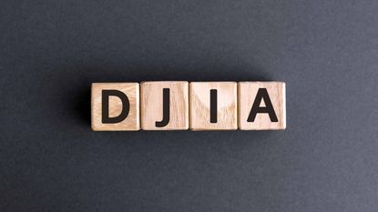 Dow Jones Industrial Average acronym, DJIA, written on wooden blocks
