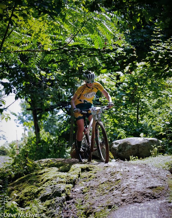 Libby White (UVM) eyeing a rocky descent