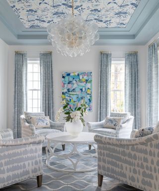 formal sitting room with pale blue and white color scheme