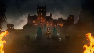 The Traitors host Claudia Winkleman and two hooded figures stood in front of Ardross Castle for The Traitors Season 2.