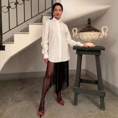 Tamu McPherson in Saint Laurent heels