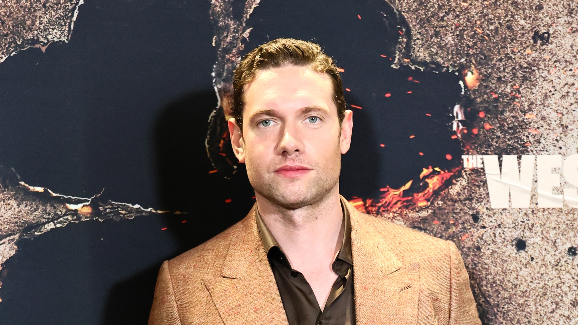 Tom Brittney posing at the "The Westies" New York Premiere