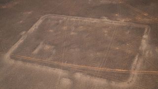 Aerial shot of Roman military camp site. It has a classic "playing card" shape.