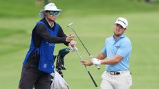 Pierceson Coody and his caddie at the Sony Open