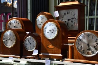 Display of Tabletop Clocks, Notting Hill Market, London, England. (Photo by: Education Images/Universal Images Group via Getty Images)