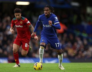 Carney Chukwuemeka of Chelsea in action during the Premier League match between Chelsea FC and Wolverhampton Wanderers at Stamford Bridge on February 04, 2024 in London, England.
