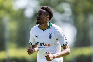 Nathan Ngoumou of Borussia Moenchengladbach in action during the friendly match between FC Oberneuland and Borussia Moenchengladbach at Marko-Mock-Arena on May 29, 2023 in Bremen, Germany.