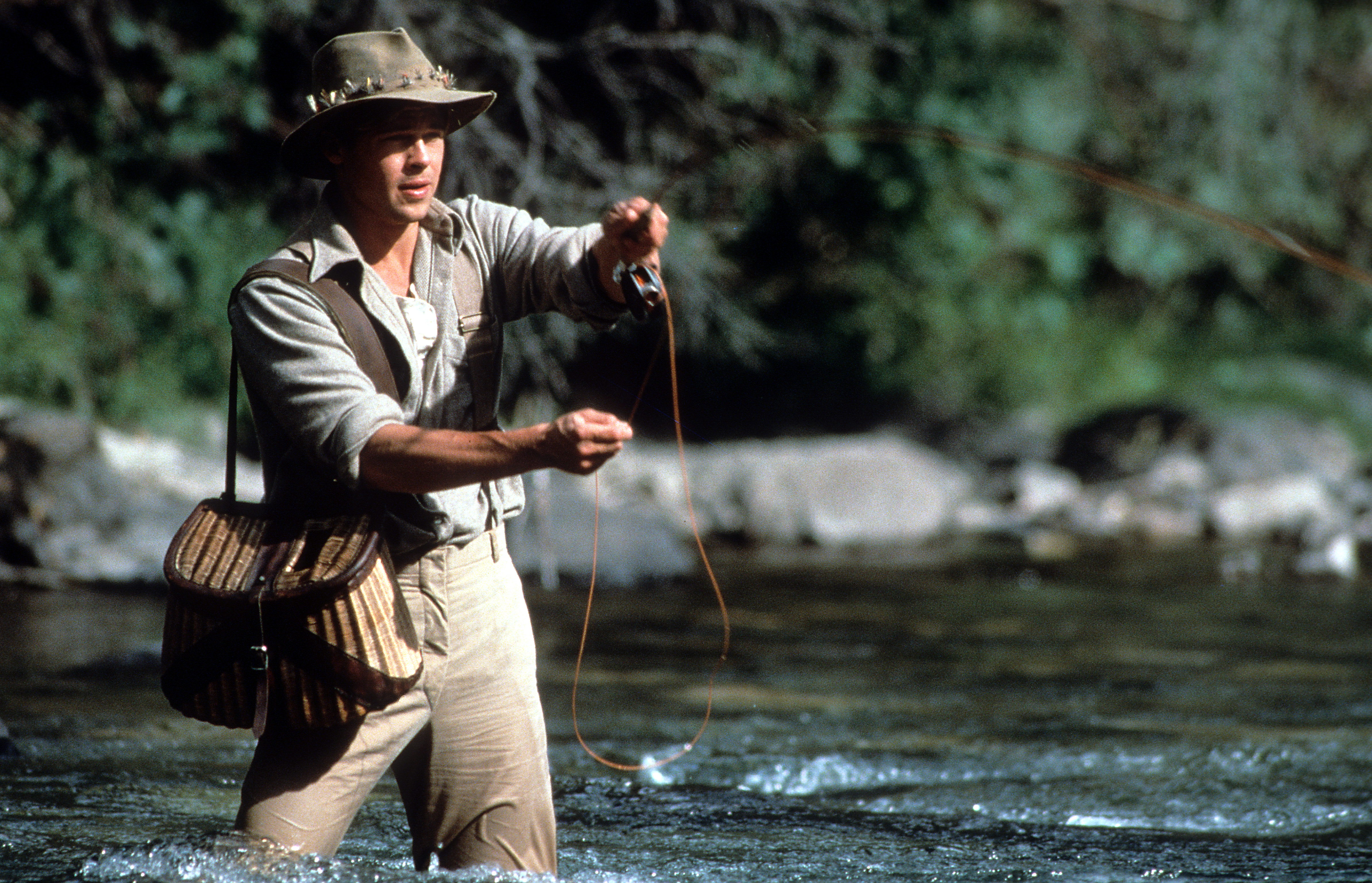 Brad Pitt casting a line in Robert Redford's 1992 film A River Runs Through It