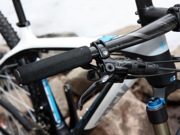 SRAM's latest XO group offers virtually identical shifting and braking performance to XX but with even more positive trigger action. These grips have got to go, though.