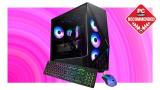 An iBuyPower Slate 9 gaming PC with mouse and keyboard on a pink background, with a PC Gamer Recommended label on top