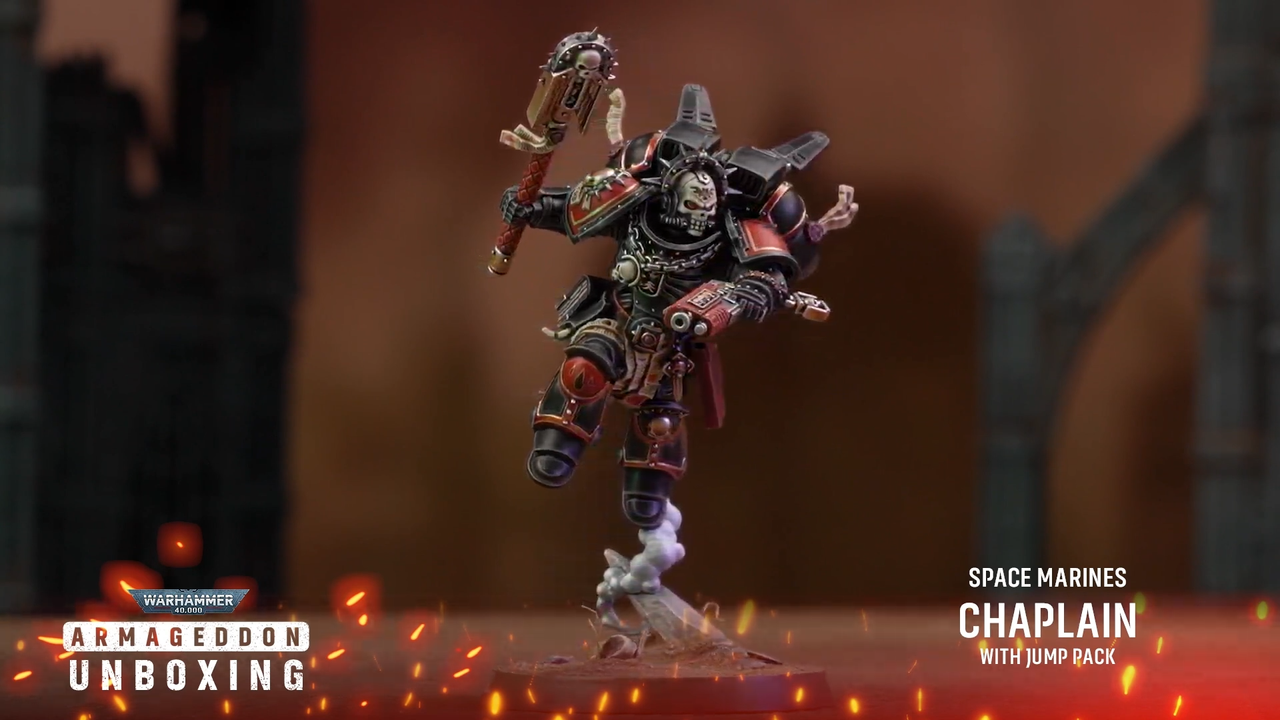Warhammer 40K Space Marine models on a rocky battlefield