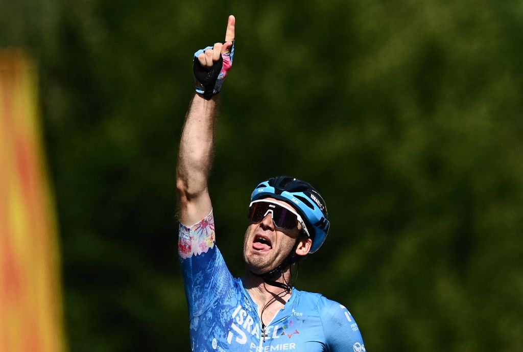TOPSHOT IsraelPremier Tech teams Canadian rider Hugo Houle celebrates as he cycles to the finish line to win the 16th stage of the 109th edition of the Tour de France cycling race 1785 km between Carcassonne and Foix in southern France on July 19 2022 Photo by Marco BERTORELLO AFP Photo by MARCO BERTORELLOAFP via Getty Images