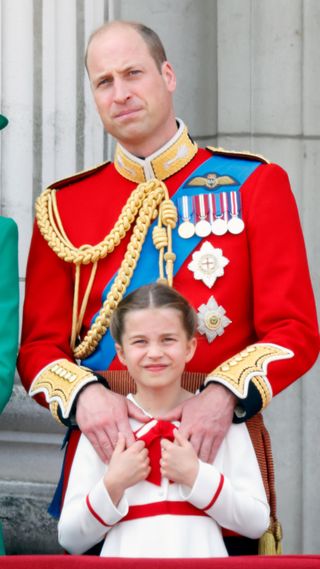 Prince William, Prince of Wales (Colonel of the Welsh Guards) and Princess Charlotte of Wales watch an RAF flypast from the balcony of Buckingham Palace during Trooping the Colour on June 17, 2023 in London, England. Trooping the Colour is a traditional military parade held at Horse Guards Parade to mark the British Sovereign's official birthday. It will be the first Trooping the Colour held for King Charles III since he ascended to the throne.