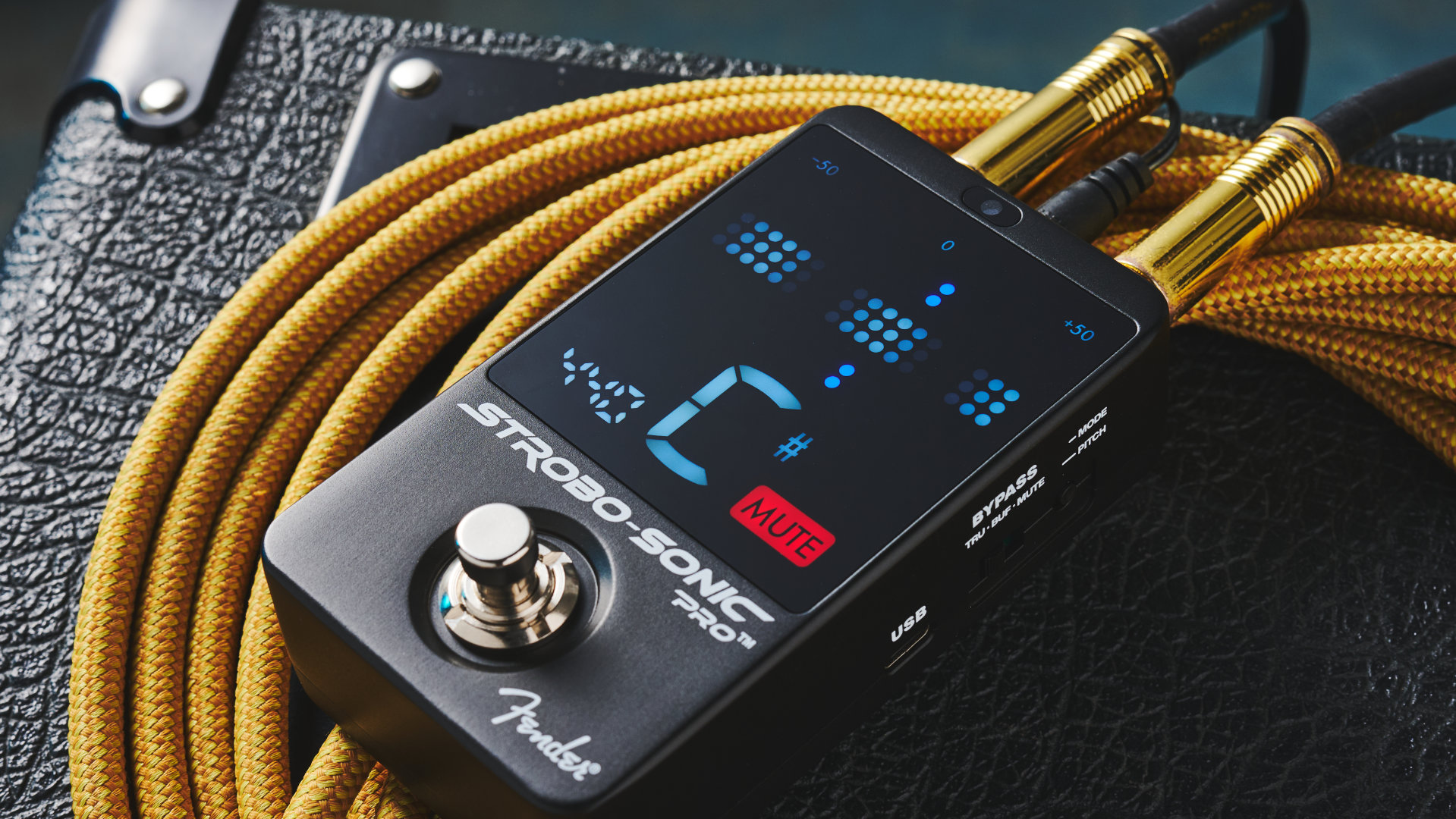 Fender Strobo-Sonic Pro Tuner Pedal on a guitar‌ amp