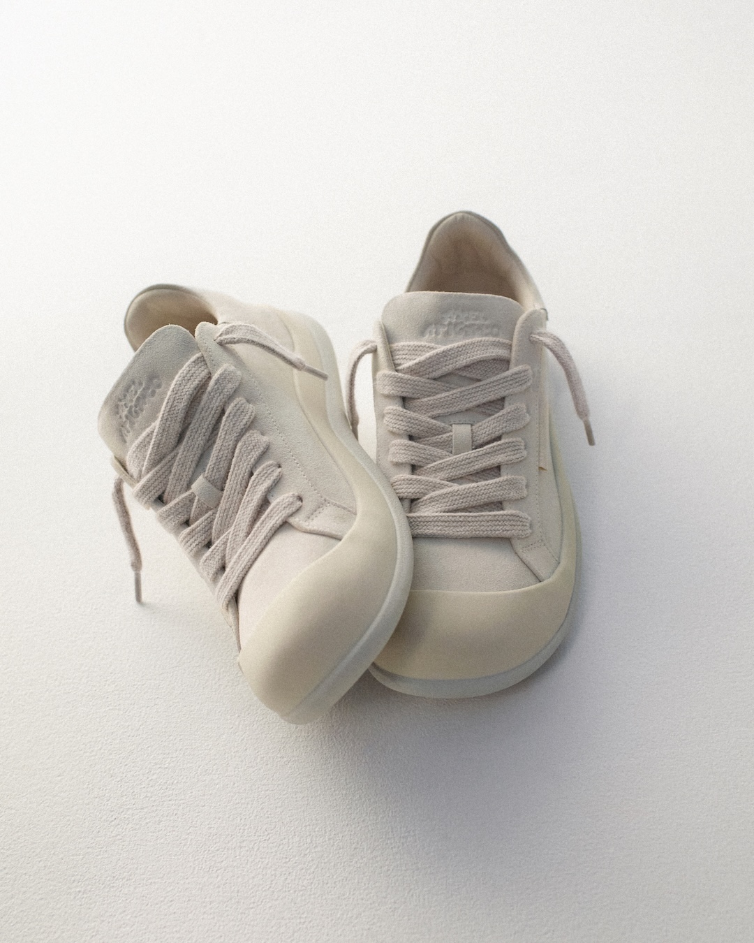 Axel Arigato Squish from different angles