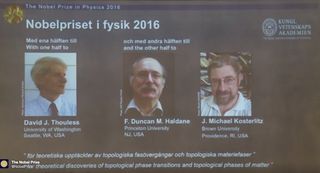 Here, a slide shown during the announcement of the 2016 Nobel Prize in physics, showing the three winners (from left to right): David J. Thouless, F. Duncan M. Haldane and J. Michael Kosterlitz.