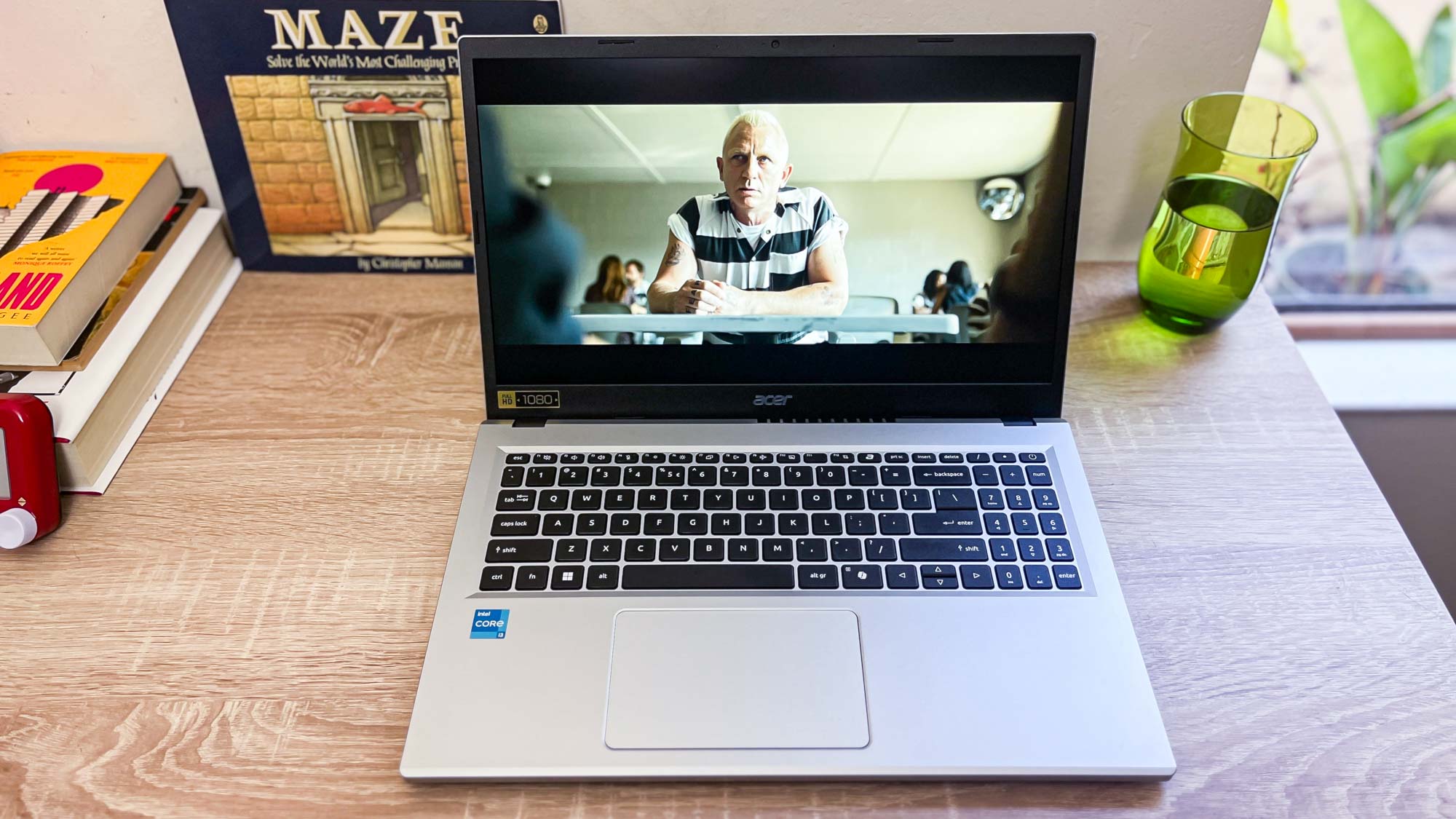 Acer Aspire Go 15 (2024) review unit on a desk playing Logan Lucky