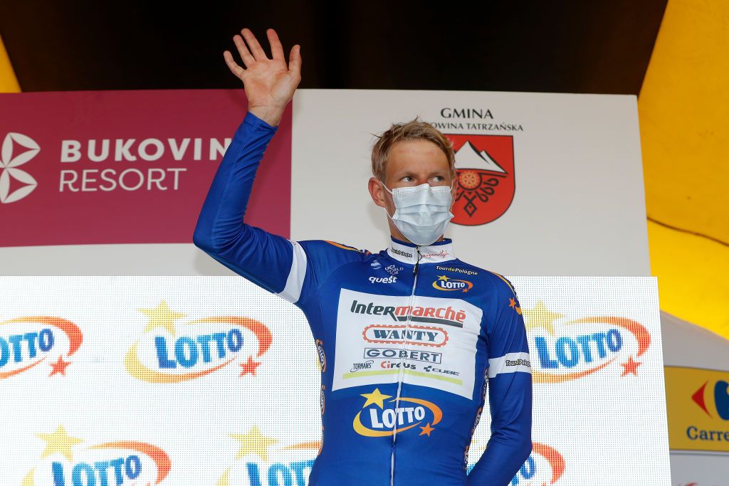 BUKOVINA RESORT POLAND AUGUST 12 Taco Van Der Hoorn of The Netherlands and Team Intermarch Wanty Gobert Matriaux Blue Most Active Rider Jersey celebrates at Podium during the 78th Tour de Pologne 2021 Stage 4 a 160km stage from Azoty Group Tarnw to Bukovina Resort 924m TourdePologne TDP2021 UCIWT on August 12 2021 in Bukovina Resort Poland Photo by Bas CzerwinskiGetty Images