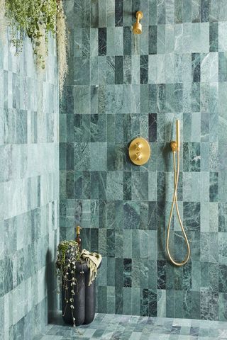 Walk-in shower ideas with Green marble tiles on the wall and floor