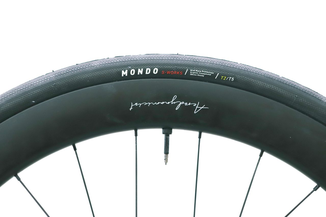 a close up of a black road bike tyre