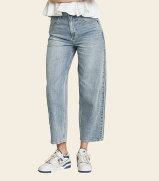 Image of blue barrel leg jeans